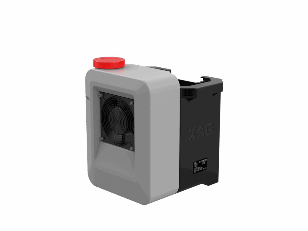 Battery Cooling Tower Rectangular device with a gray front, black sides, a red circular cap on top, and a visible cooling fan on the front panel. The side is marked with "XAG.